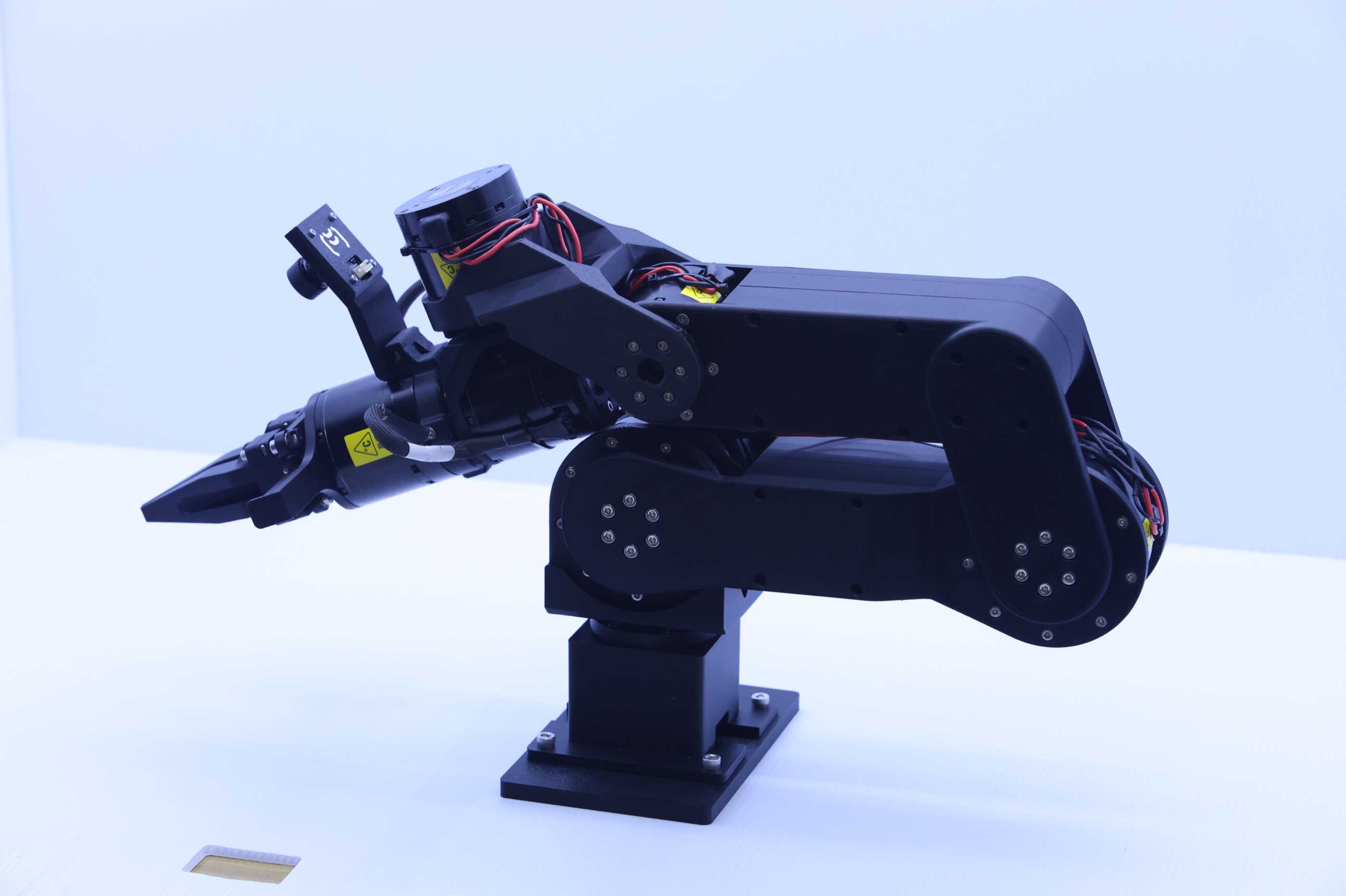 Maker Arm fully assembled and bench-tested, shown from the side