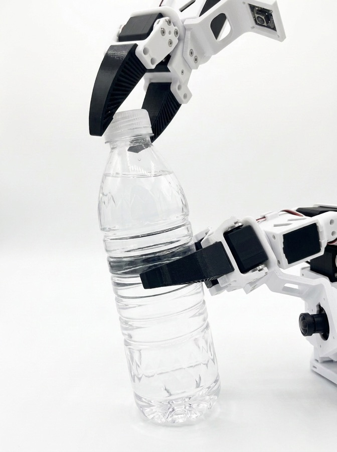 Two SO-101 robot arms holding and opening a bottle